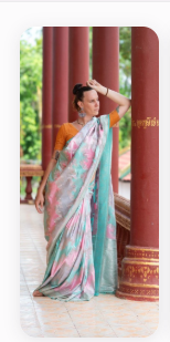 Romana in a sari by temple pillars